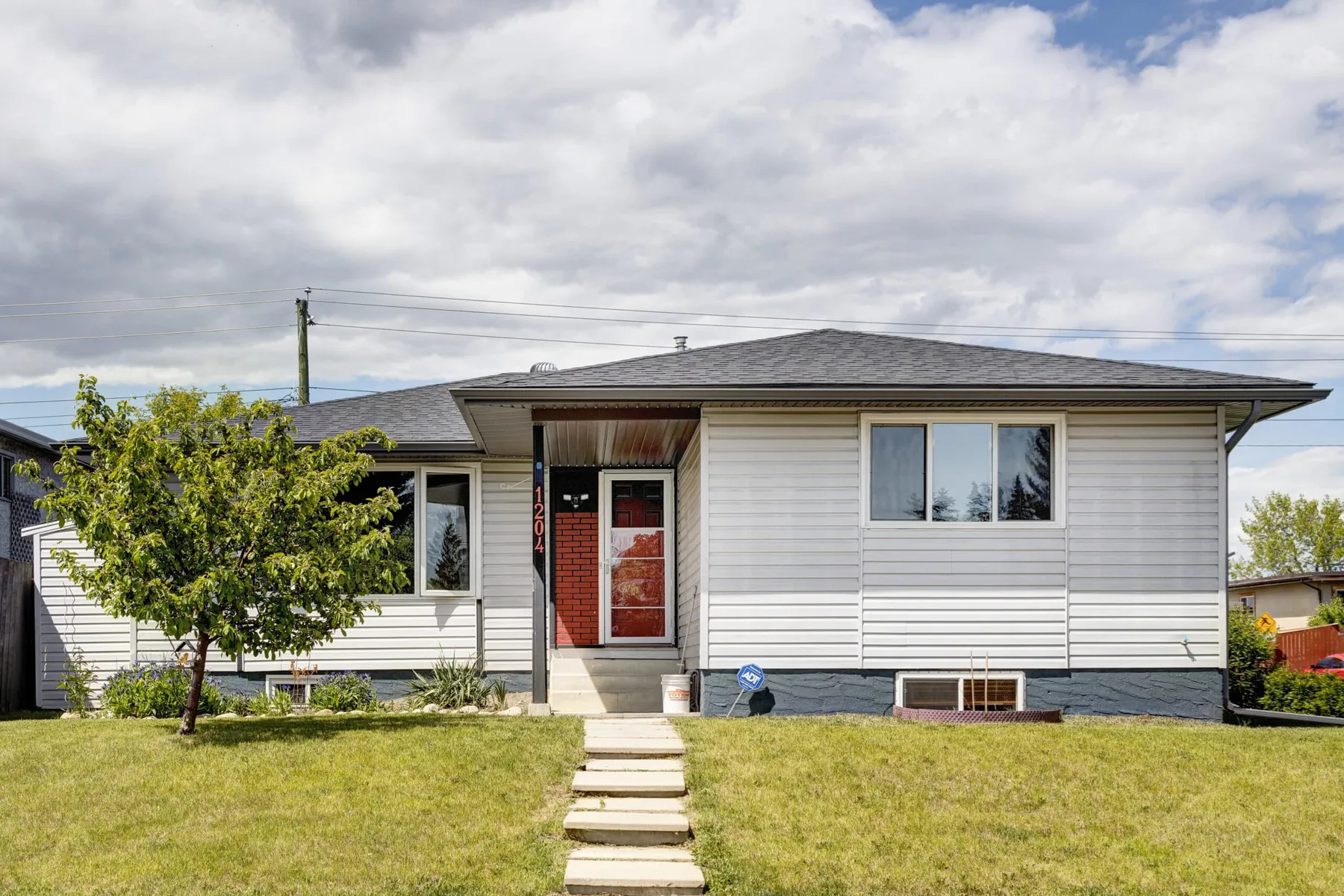 Buy a home in Airdrie: bungalow sold by Pursuit Realty Group