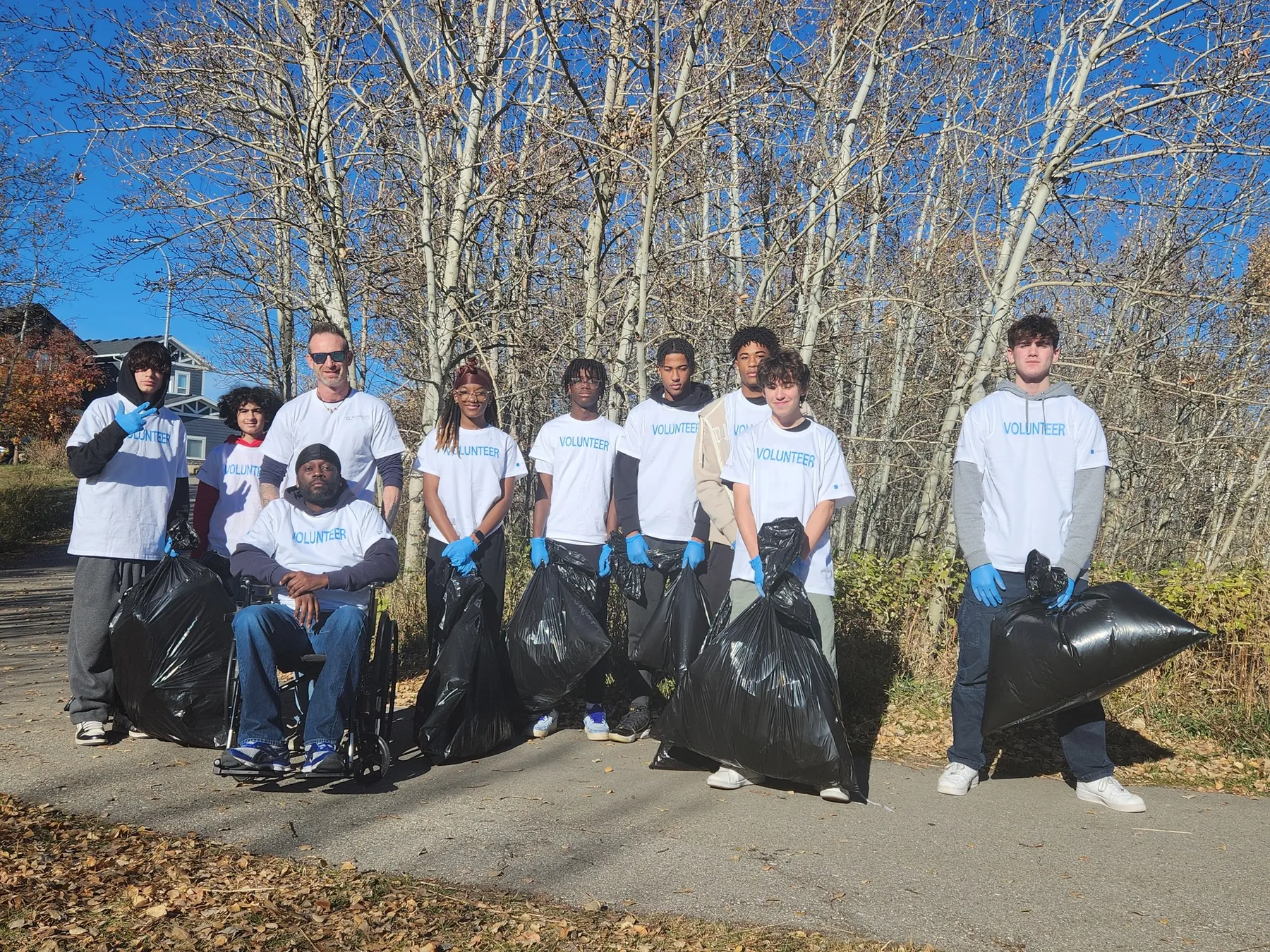 Community involvement: Pursuit Realty community cleanup in Airdrie
